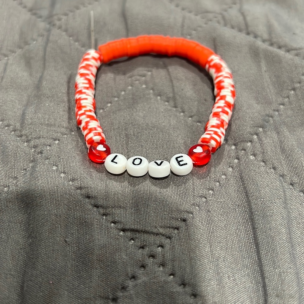 Handmade bracelet by 9yr old. 6.3” circumference. Clay beads, soft & bright.
